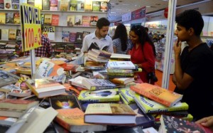 Visitors having a close look at the books available at the 21st Delhi Book Fair at Pragati Maidan, in New Delhi in August, 2015. Photo: Sushil Kumar Verma ( The Hindu) 